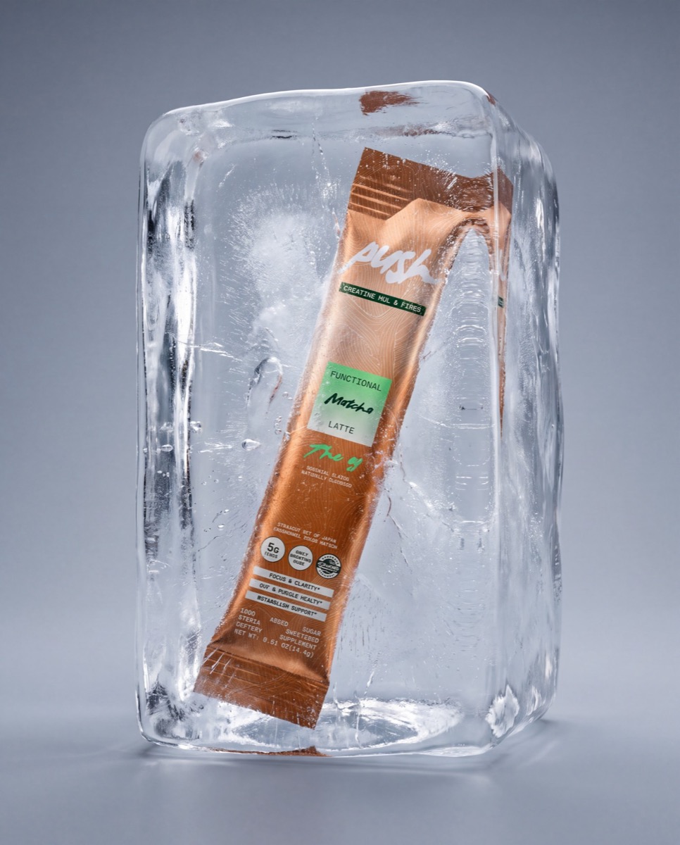 A Push stick frozen inside a block of ice
